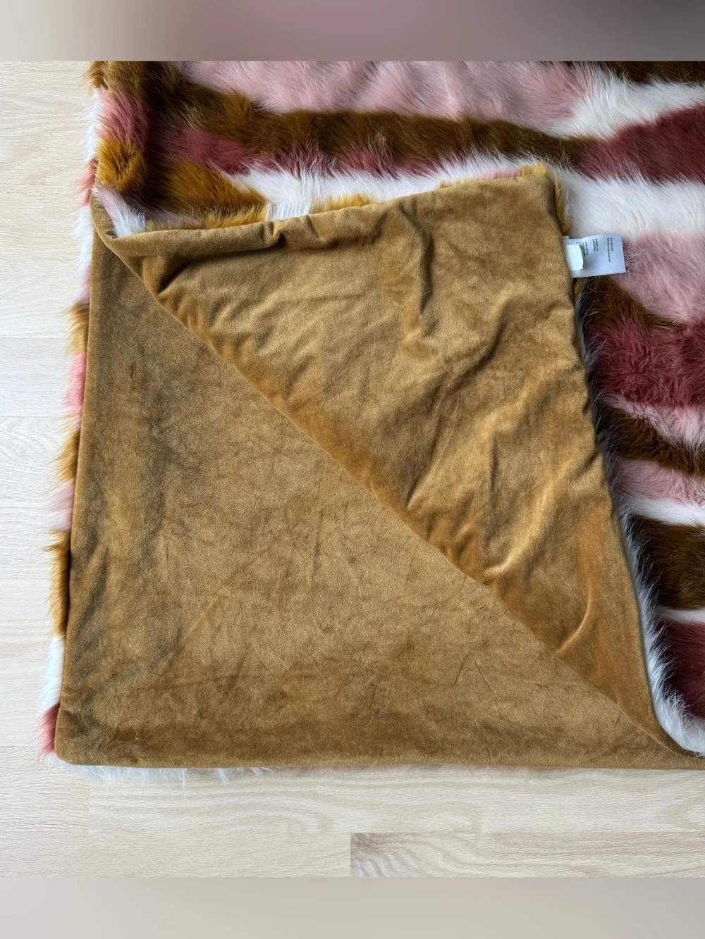 Anthropologie Fauna Faux Fur Throw Blanket in Pink and Gold